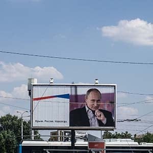 A billboard of Vladimir Putin reads "Crimea. Russia. Forever" in Simferopol on August 17, 2015 in Simferopol, Crimea. Russian President Vladimir Putin signed a bill in March 2014 to annexe the Crimean peninsula but Ukraine and most of the international community do not recognise its annexation. (Alexander Aksakov/Getty Images)