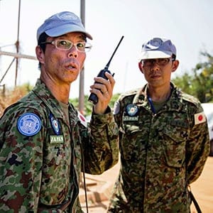 Members of the Japanese Ground Self-Defence Force (GSDF) prepare the arrival of new troops at the compound of the United Nations peacekeeping mission (UNMISS) upon their arrival in Juba, South Sudan, on November 21, 2016.
A United Nations plane landed in the morning at Juba airport with 60 new Japanese peacekeepers as the first group of the 350-strong unit, which will replace the current Japanese troops at the UN mission in South Sudan. The group, mostly engineers, will construct roads and facilities and are also assigned for the first time under Japans new security law, which enables GSDF troops to use weapons to rescue UN staff under attack. (Albert Gonzalez Farran/AFP/Getty Images)