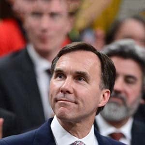 Liberal Members of Parliament give Minister of Finance Bill Morneau a standing ovation as he delivers the federal budget in the House of Commons on Parliament Hill in Ottawa, Wednesday March 22, 2017. (Sean Kilpatrick/CP)