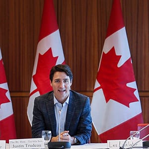 Prime Minister Justin Trudeau, centre, attends a meeting of the Prime Minister's Youth Council in Calgary on Wednesday, Jan. 25, 2017. (Jeff McIntosh/CP)