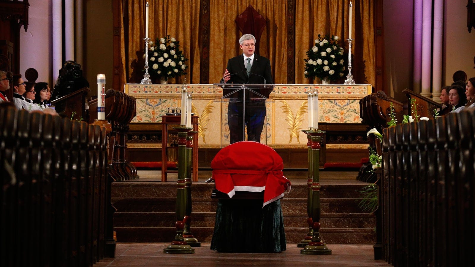 Canada's Prime Minister Stephen Harper speaks at the state funeral for former finance minister Jim Flaherty in Toronto, April 16, 2014. REUTERS/Mark Blinch (CANADA - Tags: POLITICS OBITUARY) - RTR3LKLO