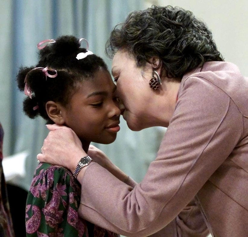 Marie-Helene Etienne-Rousseau, of Sainte-Jeanne-D'Arc-de-Lefebvre, Que, is kissed by Governor General Adrienne Clarkson after Etienne-Rousseau was decorated with Medal of Bravery at Rideau Hall in Ottawa, Friday, December 8, 2000. (Fred Chartrand/CP)