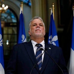 Quebec's Premier elect Philippe Couillard looks on during a news conference at the National Assembly in Quebec City