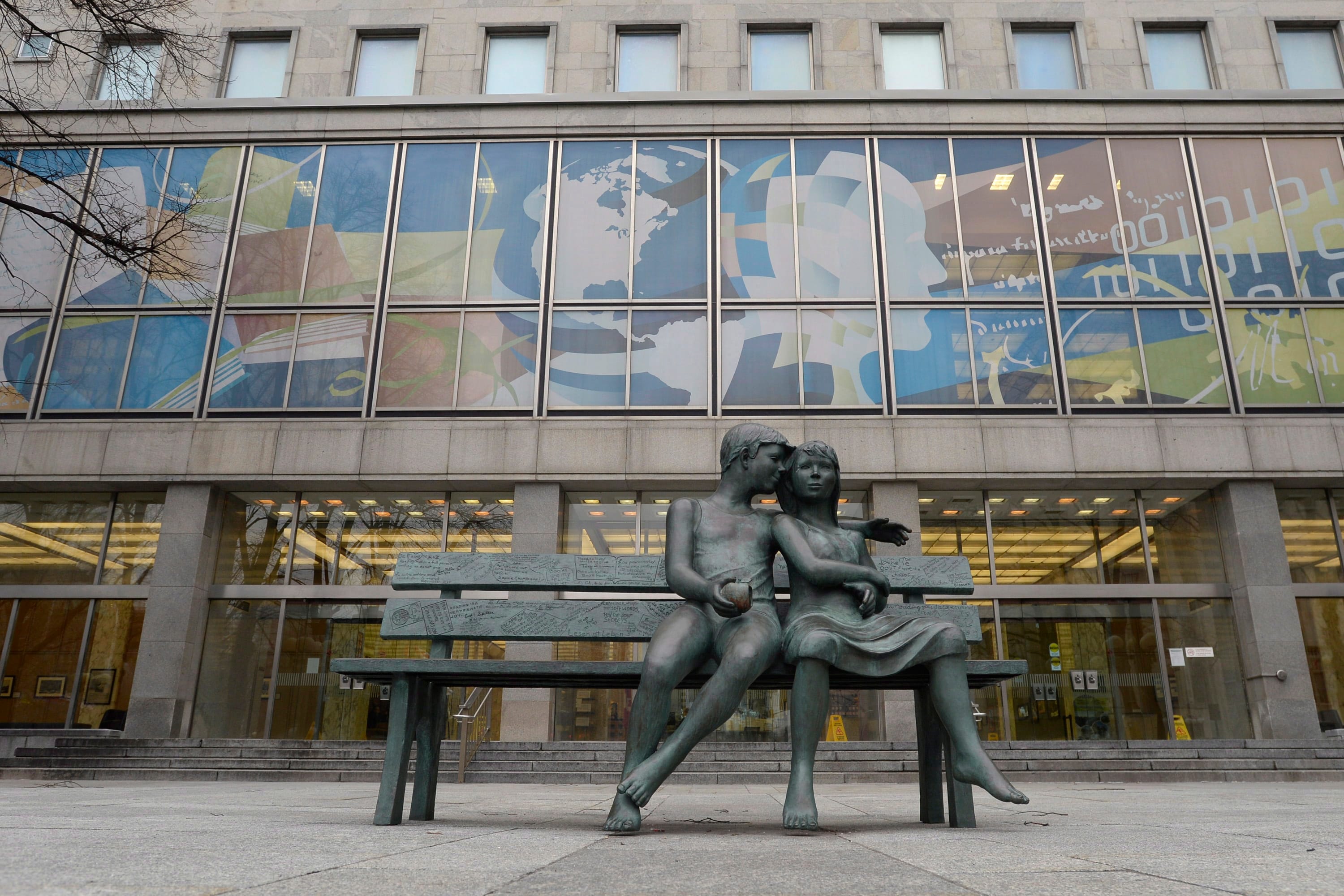A statue sits at the entrance of a Library and Archives Canada building in Ottawa. (Adrian Wyld/The Canadian Press)