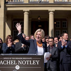 Alberta Premier-designate Rachel Notley addresses the media in front of her caucus in Edmonton, Alta., on Saturday, May 9, 2015. THE CANADIAN PRESS/Jason Franson