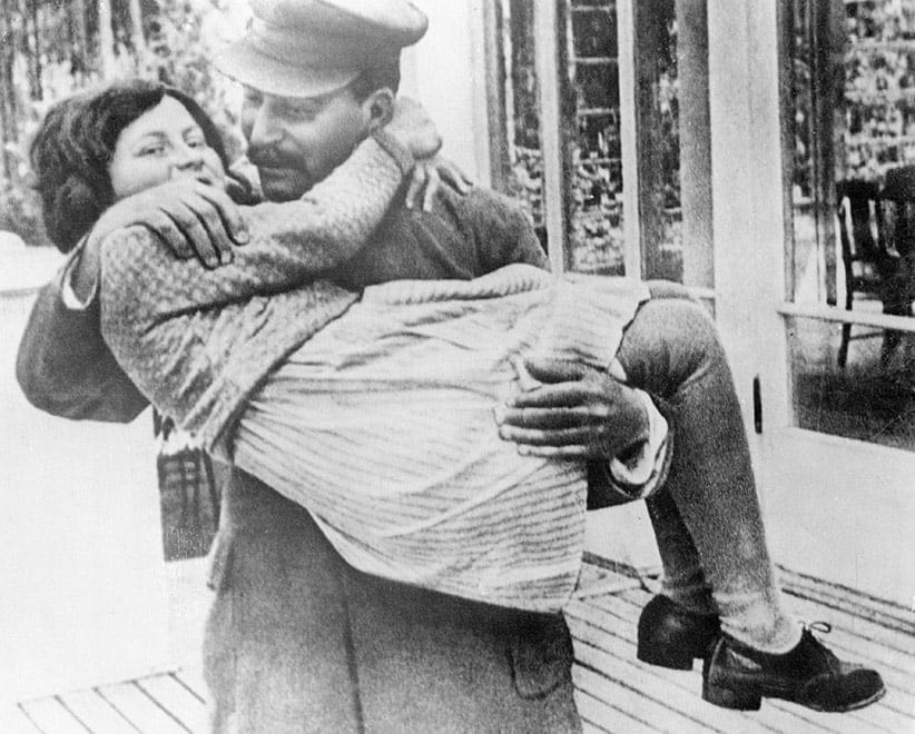 A rare photo of Marshal Josef Stalin holding his daughter, Svetlana. The photo was taken in 1937, at Stalin's country house in the suburbs of Moscow. (Bettmann/CORBIS)