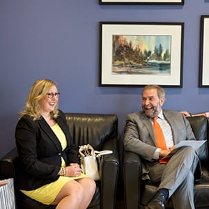Diane Freeman, left, talks with Thomas Mulcair. (Photograph by Jenna Marie Wakani)