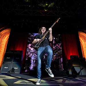Geddy Lee performs on stage during Rush's R40 Tour in Austin, Texas. (Randy Johnson)