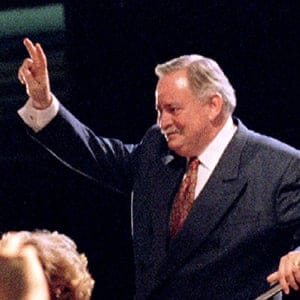 Quebec Premier and leader of the "YES" forces, Jacques Parizeau, gives the victory sign to supporters even though they lost the referendum, following his speech October 30. The "NO" side just edged out the separatists 50.6 percent to 49.4 percent (Andy Clark/Reuters)