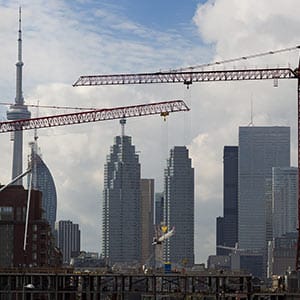 Construction work continues on condominiums in the Canary District in Toronto on Oct. 17, 2013. The buildings will be used to house athletes during the Pam Am 2015 Toronto games. Peter Power/The Globe and Mail/CP
