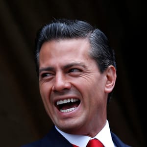 Mexico's President Enrique Pena Nieto smiles during a military parade celebrating Independence Day at Zocalo Square in downtown Mexico City, September 16, 2014. Edgard Garrido/Reuters
