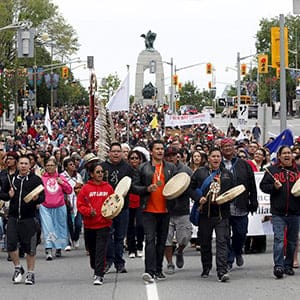 Drummers lead the Walk for Reconciliation in Ottawa May 31, 2015. The event is one of many surrounding the release of the final report from the Truth and Reconciliation Commission on the former Canadian Indian residential school system, which will be released June 2. (Chris Wattie/Reuters)