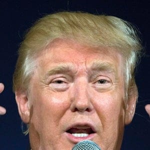 Republican presidential hopeful Donald Trump remarks about Texas Gov. Rick Perry's glasses at his South Carolina campaign rally in Bluffton, S.C., Tuesday, July 21, 2015. (AP Photo/Stephen B. Morton)