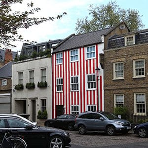 LONDON, ENGLAND - APRIL 29: A townhouse that was painted in red and white stripes by its owner Zipporah Lisle-Mainwaring after a planning dispute with her neighbours is pictured on April 29, 2015 in London, England. Mrs Lisle-Mainwaring has since been ordered by the local council, the Royal Borough of Kensington and Chelsea, to paint it white and restore the window frames. (Carl Court/Getty Images)