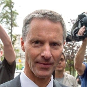Nigel Wright, former chief of staff to Prime Minister Stephen Harper, makes his way through a crush of media as he arrives to testify at the criminal trial of embattled Sen. Mike Duffy in Ottawa Wednesday, August 12, 2015. THE CANADIAN PRESS/Justin Tang
