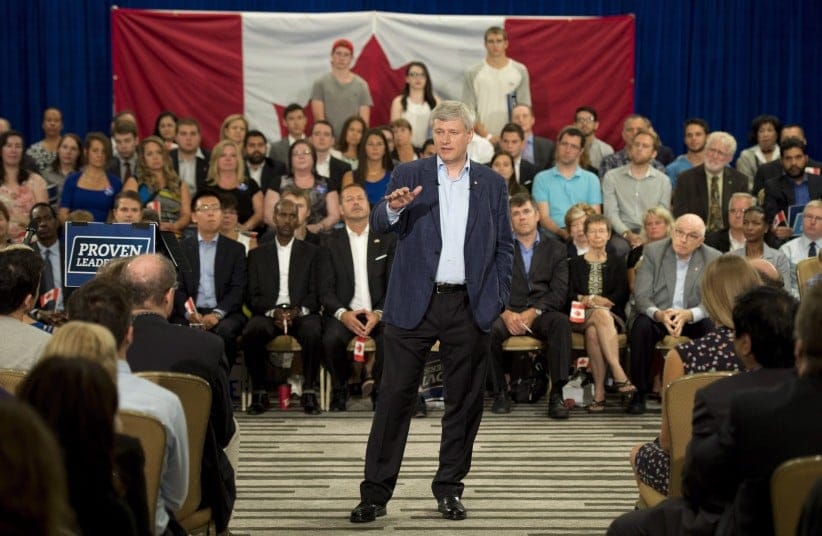 Conservative leader Stephen Harper speaks to supporters during a campaign stop in Ottawa, Monday, August 31, 2015. THE CANADIAN PRESS/Adrian Wyld