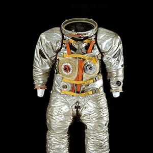 Suit: A4-H, Prototype. Year: 1965. Created by Hamilton Standard, this suit was designed for Apollo training purposes only. Suits are tested in a pool alternatively known as a Weightless Environment Test Facility. The nylon
and aluminum suit is filled with air, as it would be in space, and weights are strapped around the tester’s waist. Testing underwater simulates the weightless feeling of being in space. (Smithsonian National Air and Space Museum)