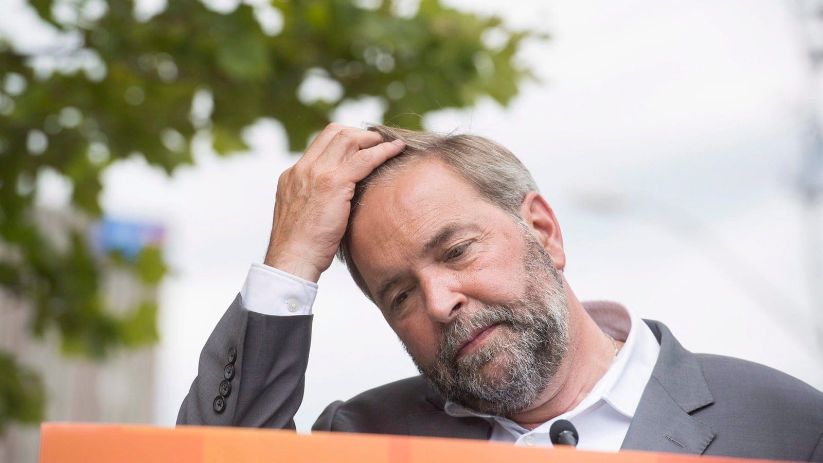 NDP Leader Tom Mulcair takes a pause as he speaks in Waterloo, Ont., on Friday, July 24, 2015. Mulcair is on his Ontario Tour for Change where he shared his plans to create more jobs for Canadians, especially in Southwestern Ontario. THE CANADIAN PRESS/Hannah Yoon