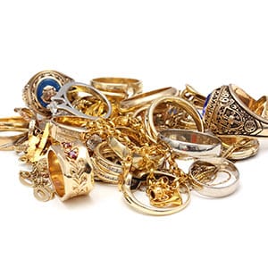 A pile of gold jewellery. Shutterstock