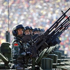 Soldiers of the People's Liberation Army (PLA) of China arrive on their armoured vehicles at Tiananmen Square during the military parade marking the 70th anniversary of the end of World War Two, in Beijing, China, September 3, 2015 (Damir Sagolj/Reuters)