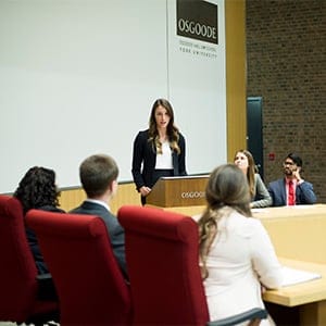MACLEANS-MOOTING-09.14.15-TORONTO, ON: (left to right) Kelsey Bishop, Paulina Bogdanova, and Raphael Jacob, Jurisdoctor law students, participate in a simulated court procedure at the York University Osgood Hall Law School mooting program. (Photograph by Cole Garside)
