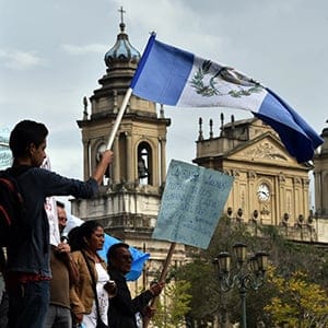 Guatemalans protest on the eve of general elections in Guatemala City on September 5, 2015. Guatemalans disgusted with rampant corruption that felled their president are set to vote Sunday in elections many see as meaningless without a vast political system cleanup. (RODRIGO ARANGUA/AFP/Getty Images)