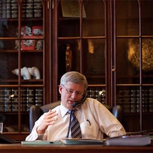 Stephen Harper speaks with President Hollande on January 16, 2013. (PMO/Flickr)