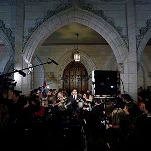 Liberal leader Justin Trudeau speaks to journalists in the foyer of the House of Commons on Parliament Hill in Ottawa April 15, 2013. (Chris Wattie/Reuters)