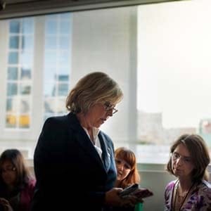 Elizabeth May looks at her phone. (Gio Ciampini/Green Party)
