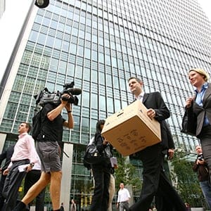 A man carries a box after leaving the Lehman Brothers European Headquarters building in Canary Wharf in east London on September 15, 2008. The British arm of US investment giant Lehman Brothers has been put into administration, accountancy firm PriceWaterhouseCoopers said Monday. The collapse of US investment giant Lehman Brothers sent shockwaves through London's financial district Monday, as the firm's staff cleared their desks while rivals voiced fears for their own jobs. (Ben Stansall/AFP/Getty Images)