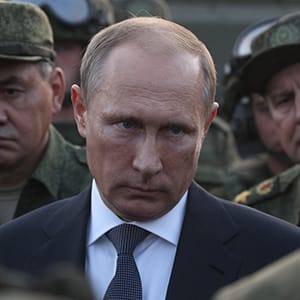 ORENBURG, RUSSIA- SEPTEMBER 19: Russian President Vladimir Putin talks to officers as he attends Russias large-scale Center-2015 military exercises at Donguzsky Range September 19, 2015 in Orenburg, Russia, The exercises, aim to contain the outbreak of an armed conflict in Central Asia. Putin said this week that it's impossible to defeat Islamic State group without support of the government of Syria and that Moscow has provided military assistance to President Bashar al-Assad's regime and will continue to do so. (Sasha Mordovets/Getty Images)