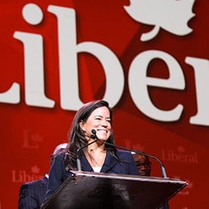 Jody Wilson-Raybould addresses the crowd with her co-chairs. Adam Scotti/Liberal Party;