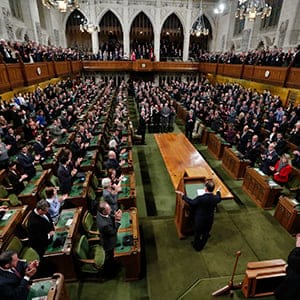 French President Francois Hollande (C) prepares to address a joint session of Parliament in the House of Commons in Ottawa November 3, 2014. REUTERS/Chris Wattie (CANADA - Tags: POLITICS) - RTR4CNRV