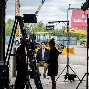 Liberal leader Justin Trudeau gives a television interview in a large garage Thursday, August 27, 2015 in Oakville, Ont. (Paul Chiasson/CP)