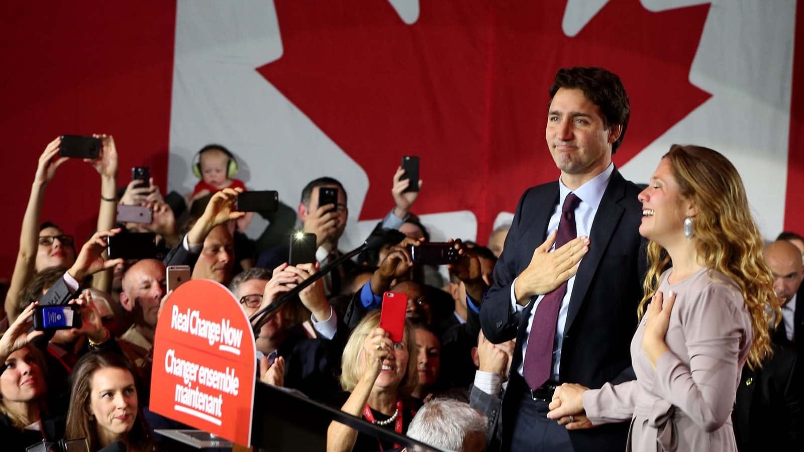 Liberal Party leader Justin Trudeau is accompanied by his wife Sophie Gregoire as he arrives to give his victory speech after Canada's federal election in Montreal, Quebec, October 19, 2015. (Christinne Muschi/Reuters)