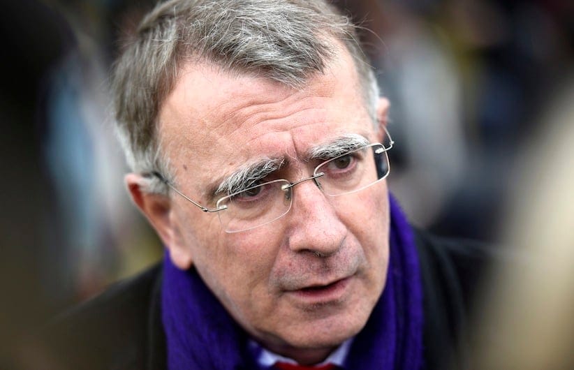 France's Ambassador to Canada Nicolas Chapuis speaks to reporters following a vigil at Nepean Point, in Ottawa, on Sunday, Nov. 15, 2015, where people gathered to honour the victims of Friday's attacks in Paris. THE CANADIAN PRESS/Justin Tang