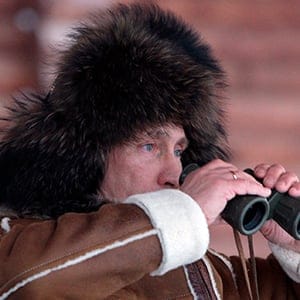 Russia's Prime Minister Vladimir Putin uses a pair of binoculars during his working visit to the Siberian Khakasiya region near Karatash settlement outside the city of Abakan February 25, 2010. (Ria Novosti/Reuters)