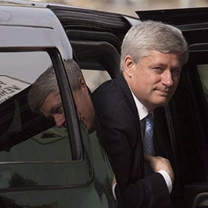 Outgoing prime minister Stephen Harper arrives at his Langevin office in Ottawa, Wednesday, Oct. 21, 2015. On his final day as prime minister, Harper reached out to a public service which his government had a tense relationship with for the last nine years.In a message sent to the entire government bureaucracy, he thanks them for the support they've shown his team over three successive Parliaments and for their dedication to the well-being of Canadians. (Adrian Wyld/CP)