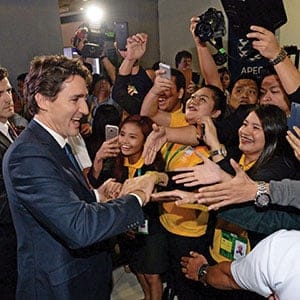 Canadian Prime Minister Justin Trudeau is greeted by crowds of hysteria as he leaves his closing press conference following the APEC Summit in Manila, Philippines on Thursday, November 19, 2015. (Sean Kilpatrick/CP)