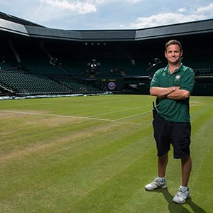 Deputy Head Groundsman Grant Cantin on centre court. The Championships Wimbledon 2014. The All England Lawn Tennis & Croquet Club Wimbledon. ( Jon Buckle/AELTC)