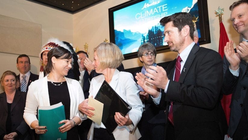Premier Rachel Notley, right, and Environment and Parks Minister Shannon Phillips after unveiling Alberta's climate strategy in Edmonton, Alberta, on Sunday, November 22, 2015. THE CANADIAN PRESS/Amber Bracken