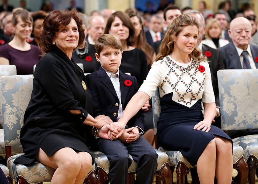 Justin Trudeau's wife Sophie Gregoire (R), son Xavier and mother Margaret (L) hold hands before he is sworn-in as Canada's 23rd prime minister during a ceremony at Rideau Hall in Ottawa November 4, 2015. (Chris Wattie/Reuters)