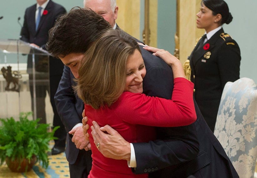 Minister of International Trade Chrstia Freehand gives Prime Minister Justin Trudeau a hug after being sworn in during ceremonies at Rideau Hall, Wednesday Nov.4, 2015 in Ottawa. (Adrian Wyld/CP)