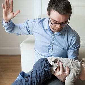 Father disciplining toddler. (Sandro Di Carlo Darsa/PhotoAlto/Getty Images)