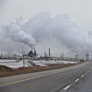 A work truck drive to the Syncrude plant in Fort McMurray Alberta, November 14, 2015. (Photograph by Jason Franson)