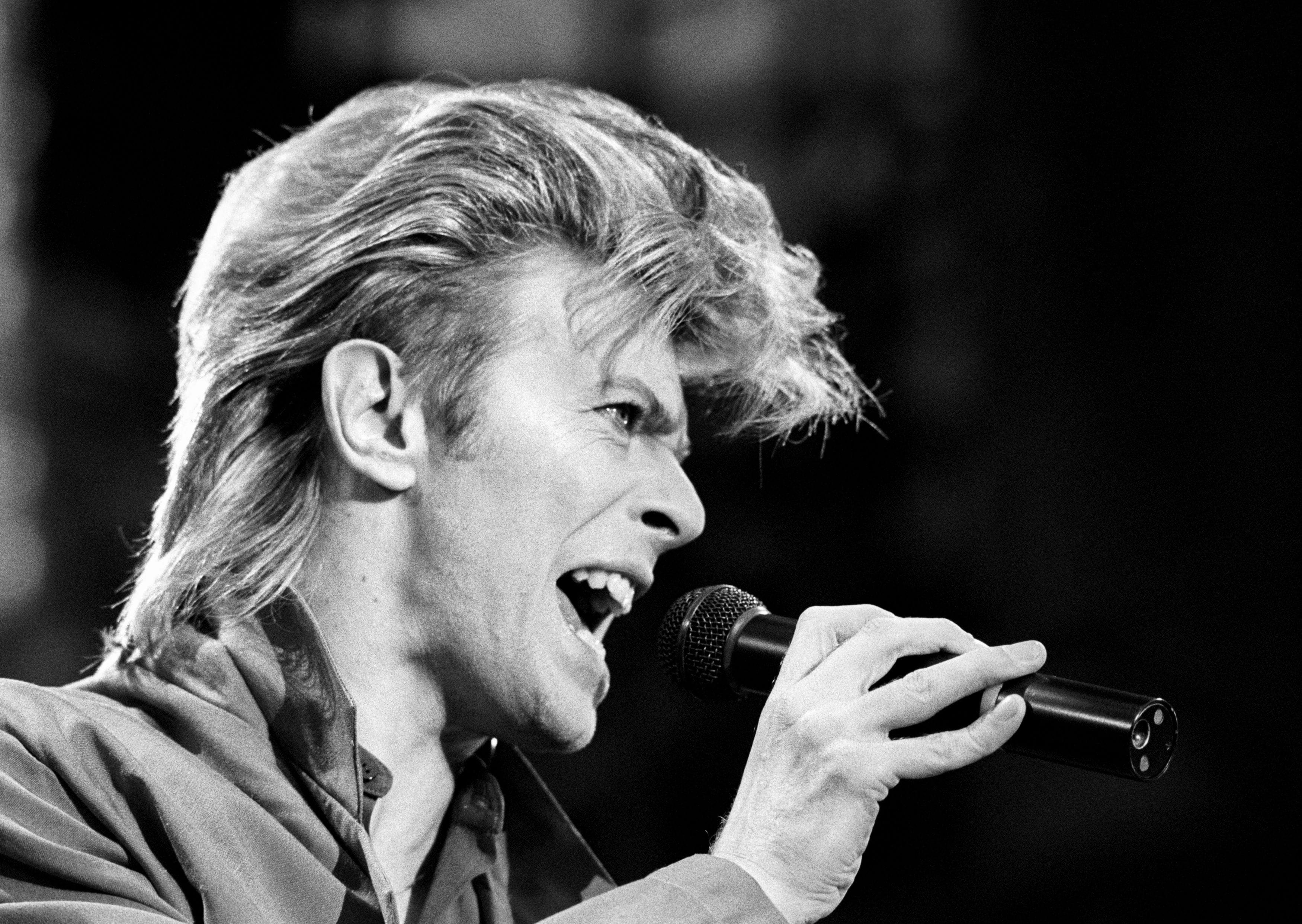 This is a June 19, 1987 file photo of David Bowie. Bowie, the other-worldly musician who broke pop and rock boundaries with his creative musicianship, nonconformity, striking visuals and a genre-bending persona he christened Ziggy Stardust, died of cancer Sunday Jan. 10, 2016. (PA, File via AP)