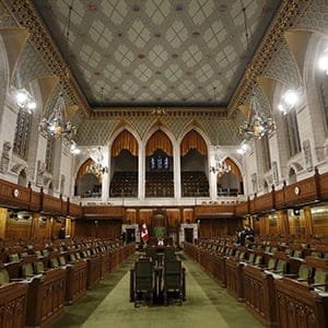 Pages and staff prepare the House of Commons on Parliament Hill in Ottawa, Canada, December 2, 2015. Members of Parliament will vote Thursday for a new Speaker of the House of Commons. (Chris Wattie/Reuters)