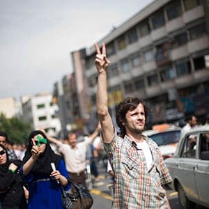 Supporters of opposition leader Mir Hussein Moussavi march in Tehran, Iran, on Monday, June 15, 2009. Hundreds of thousands of people marched in silence through central Tehran on Monday to protest Iran?s disputed presidential election in an extraordinary show of defiance that appeared to be the largest antigovernment demonstration here since the 1979 revolution. (The New York Times)