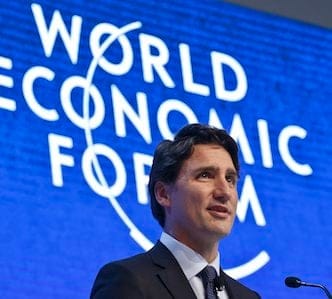 Canada's Prime Minister Justin Trudeau gestures as he speaks during a panel"The Canadian Opportunity"at the World Economic Forum in Davos, Switzerland, Wednesday, Jan. 20, 2016. (AP Photo/Michel Euler)