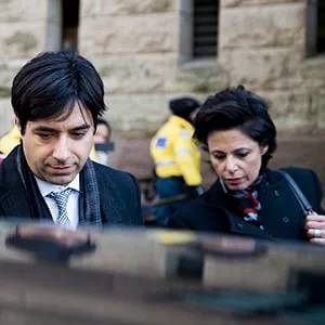 Jian Ghomeshi (middle) leaves with co counsel Danielle Robitaille (left) and lawyer Marie Henein.Jian Ghomeshi exits the courthouse after his trial arguments ended. The verdict is to come March 24. (Carlos Osorio/Toronto Star/Getty Images)